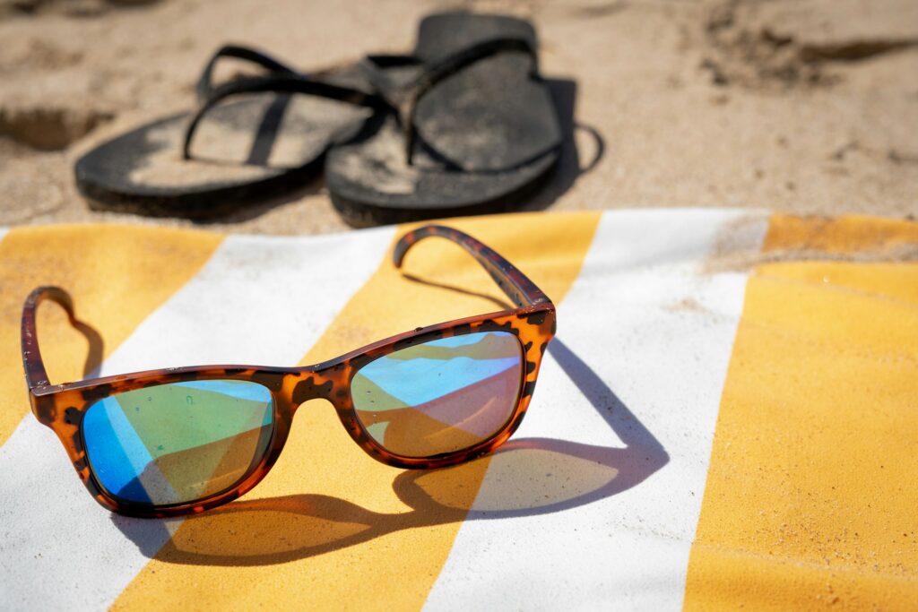 Sunglasses on a beach towel